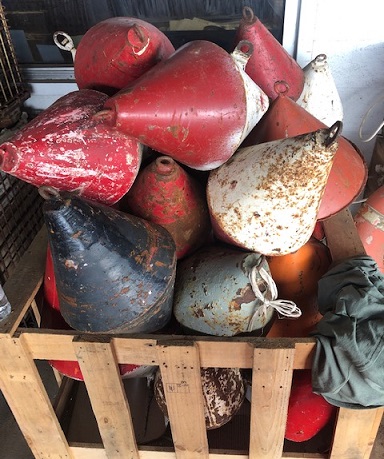 A Small Collection of Antique and Vintage Fishing Buoys, Netting and Floats  From Maritime Canada. 